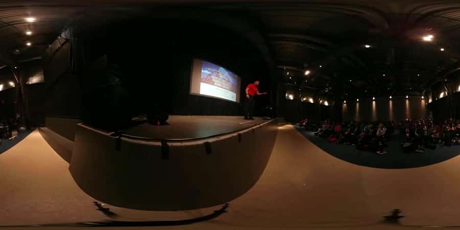 360 video of an event venue, an audience filling in